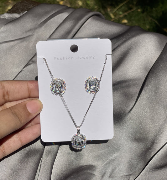 The Grand Emerald-Cut Halo Set